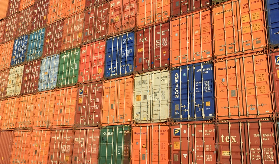 background of containers stacked in rows